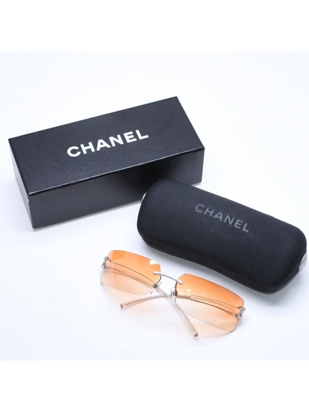 Chanel Rimless Sunglasses Orange Gradient Lens Rhinestone CC Logo Silver Eyewear